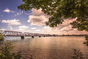 landscape photography of steel bridge across body of water during daytime