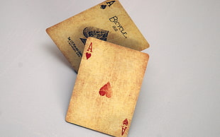 two Aces of Heart and Spade playing cards