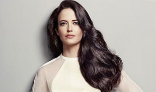 woman with long hair wearing white top
