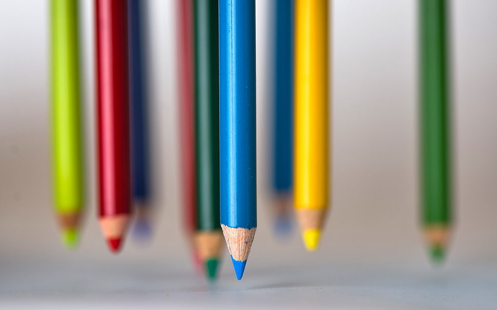 blue coloring pen in tilt shift photography HD wallpaper