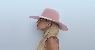 woman side view wearing pink hat