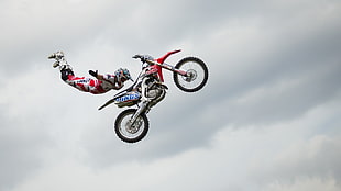 red and white motocross dirt bike, vehicle, motorcycle