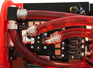 black PCB board with red cable attachments, computer