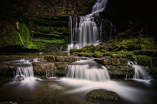 green and brown waterfall photo