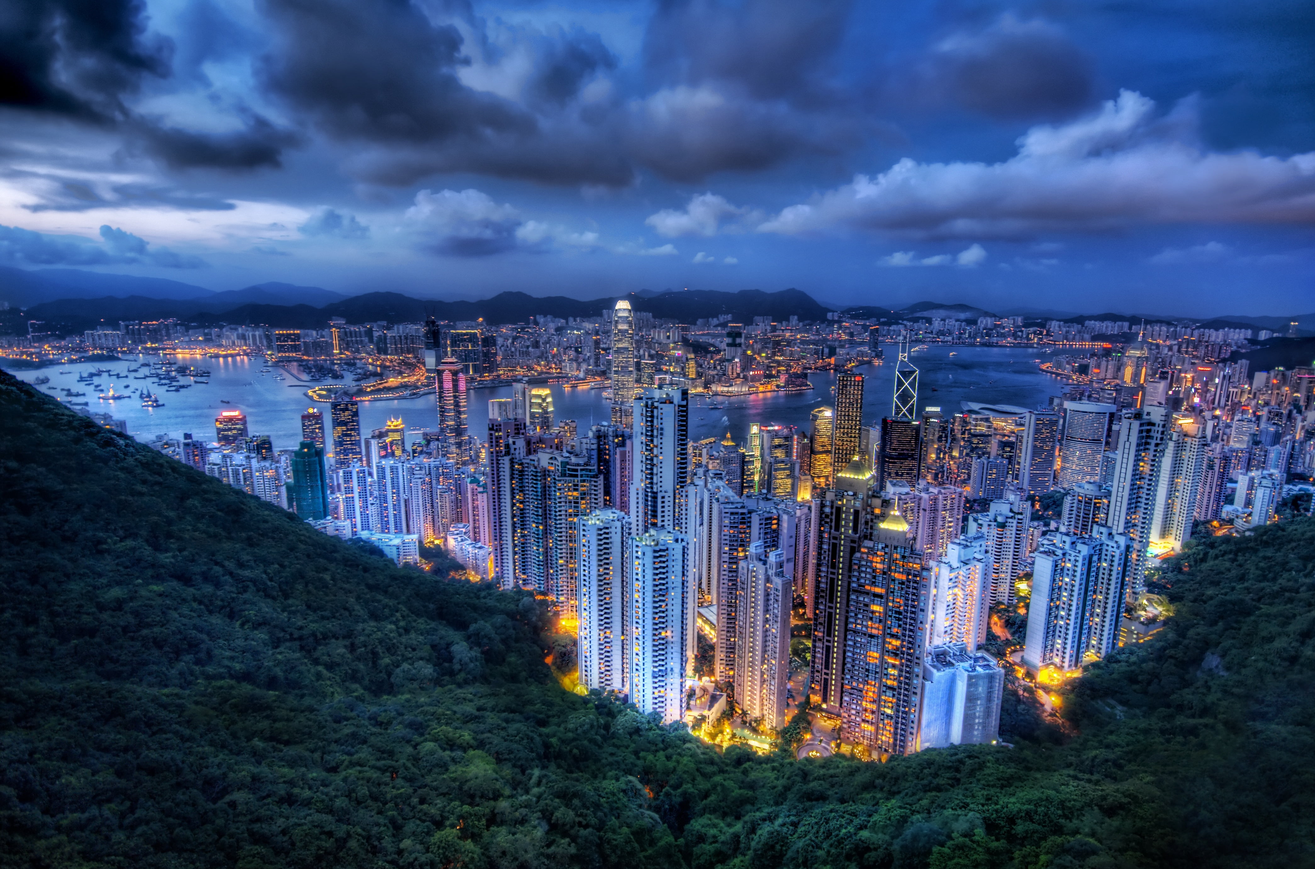 birds eye view of high buildings and body of the water