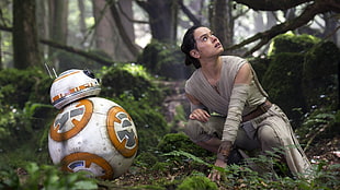BB-8 and woman wearing gray crew-neck sleeveless top wallpaper