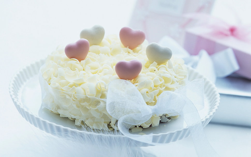round pastries with heart toppings HD wallpaper
