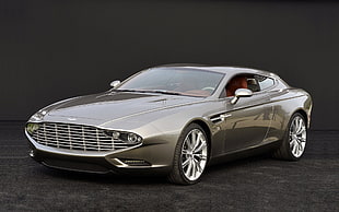 silver Aston Martin coupe