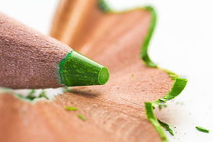 shallow focus photography of green colored pencil, lime