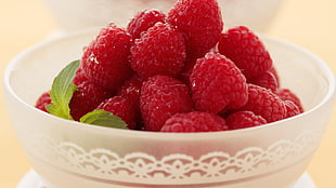 strawberry fruits on white bowl