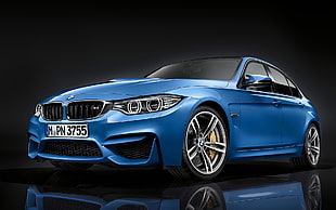 blue BMW sedan
