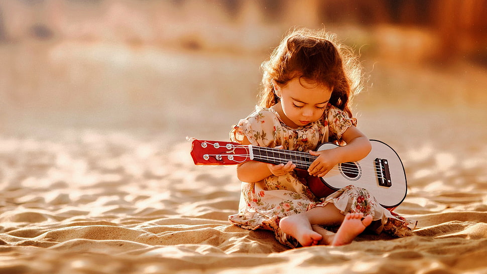 focus photography of girl holding guitar HD wallpaper