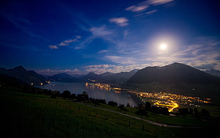 photo of village near body of water and mountain with yellow lights, landscape, Luzern HD wallpaper