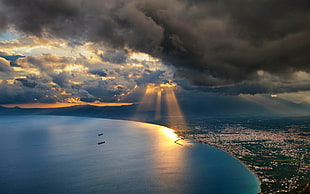 aerial photography of body of water, nature, landscape, sunset, sun rays