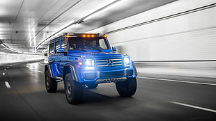 blue Mercedes-Benz G-class in tunnel