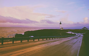 white lighthouse, road, light house
