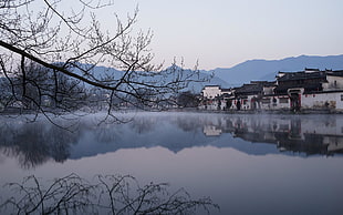 white concrete house, Chinese architecture, lake