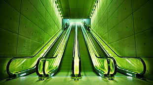 green and white metal frame, arch, green, escalator