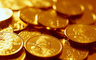 round gold-colored coin collection HD wallpaper