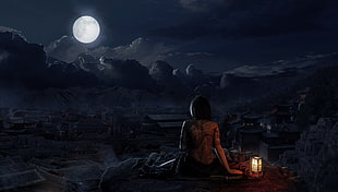 topless woman lying on rock next to lantern facing moon