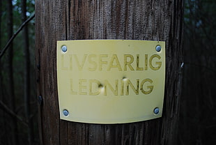 yellow paper, wires, Swedish, warning signs