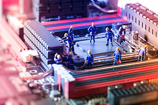 computer processor with people in blue clothes miniature