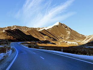 photo of road and mountains during day time HD wallpaper