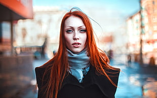 hallow focus photography of woman with red hair