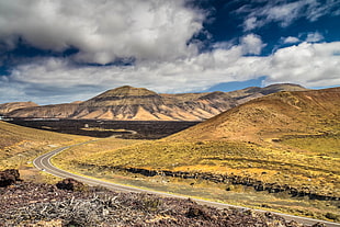 photography of hills during daytime, lanzarote