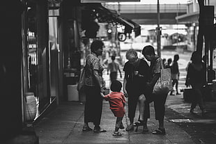 child's red dress, city, old people, selective coloring, children