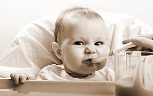 Baby drinking medicine HD wallpaper