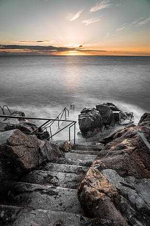 stone stairs in seashore photograph HD wallpaper