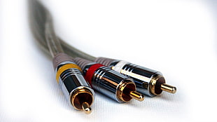 gray and silver RCA cable