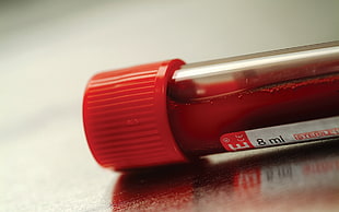 8 ml vial with red liquid inside