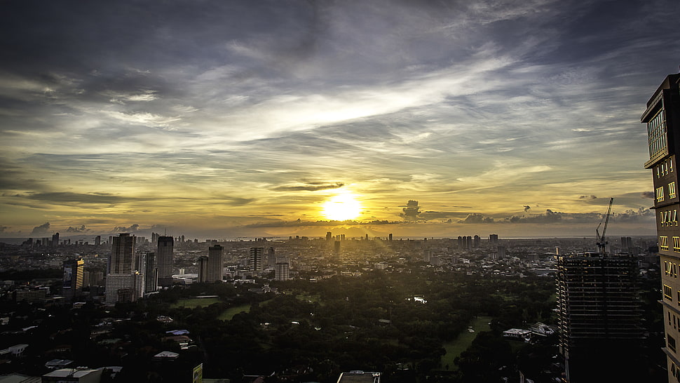 Aerial photography of city near body of water during golden hour, manila HD wallpaper