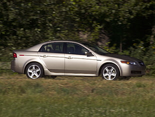 silver sedan on green grass field during daytime HD wallpaper