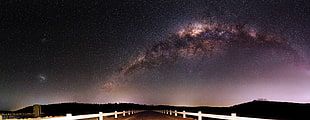nebula over white and brown bridge during night time, western australia HD wallpaper