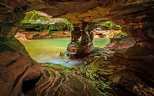 brown cave with body of water, nature, landscape, water, rock