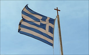 beige and blue striped with cross flag photography
