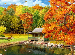brown wooden house near body of water surrounded by trees painting