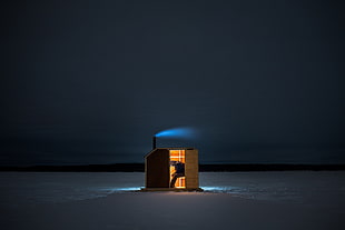 brown wooden shed in middle of snowfield, people, night, landscape, alone