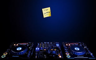 black DJ turntable turned on