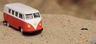 white and red Volkswagen RV toy