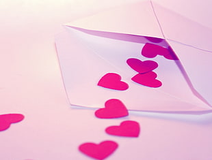 pink hearts inside of white envelop HD wallpaper