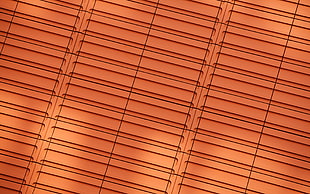 closeup photo of brown window blind