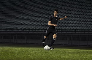 man playing soccer HD wallpaper
