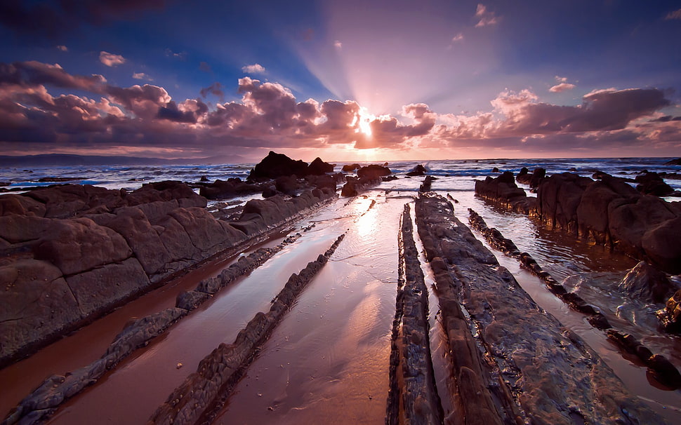 brown rocks, nature, sunset, sea, clouds HD wallpaper