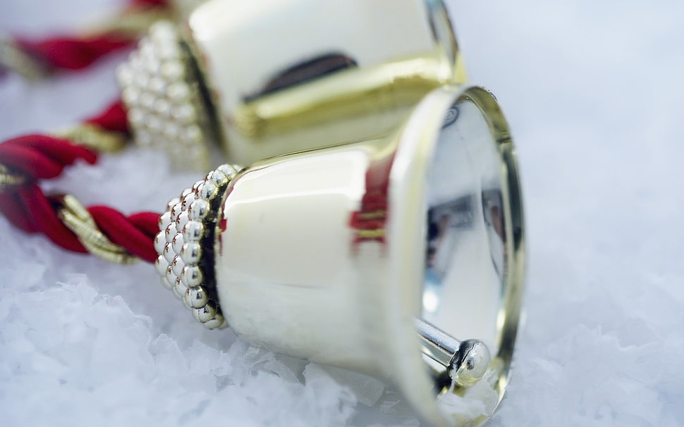 selective focus of white ceramic bell hanging decor HD wallpaper