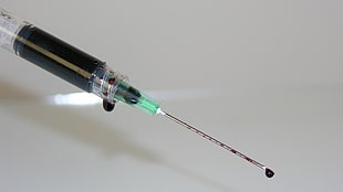 syringe with blood HD wallpaper