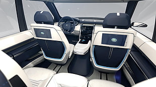 photography of white and blue leather vehicle interior